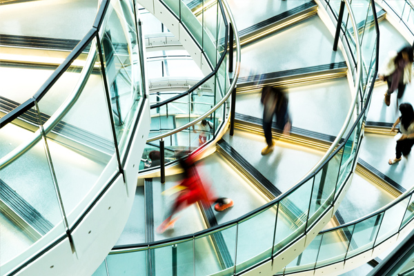 People moving through a connected building
